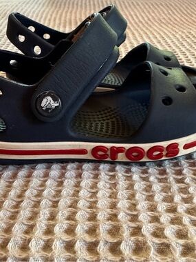 CROCS Kids Navy Sandal with Red Logo Trim
